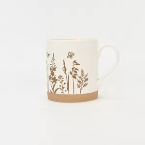 floral handle ceramic mug, nature-inspired coffee mug, botanical print ceramic cup, rustic clay texture mug, plant-themed tea mug, aesthetic nature mug