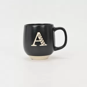 floral handle ceramic mug, nature-inspired coffee mug, botanical print ceramic cup, rustic clay texture mug, plant-themed tea mug, aesthetic nature mug