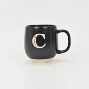 floral handle ceramic mug, nature-inspired coffee mug, botanical print ceramic cup, rustic clay texture mug, plant-themed tea mug, aesthetic nature mug