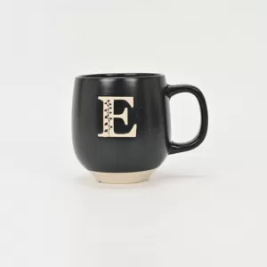 floral handle ceramic mug, nature-inspired coffee mug, botanical print ceramic cup, rustic clay texture mug, plant-themed tea mug, aesthetic nature mug
