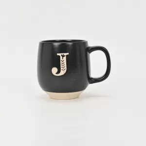 floral handle ceramic mug, nature-inspired coffee mug, botanical print ceramic cup, rustic clay texture mug, plant-themed tea mug, aesthetic nature mug
