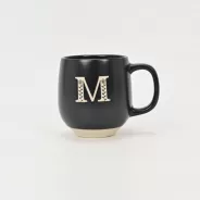 floral handle ceramic mug, nature-inspired coffee mug, botanical print ceramic cup, rustic clay texture mug, plant-themed tea mug, aesthetic nature mug